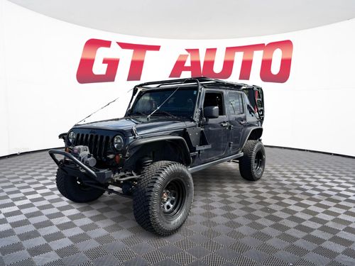 2012 Jeep Wrangler Unlimited Sahara Lower Image 1