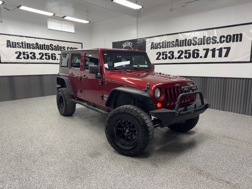 10990 - 2013 Jeep Wrangler Unlimited Sport