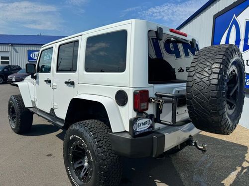 2012 Jeep Wrangler Unlimited Sahara Lower Image 1
