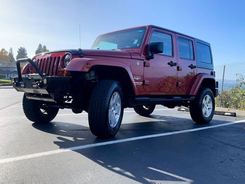 2012 Jeep Wrangler Unlimited Sahara Lower Image 1