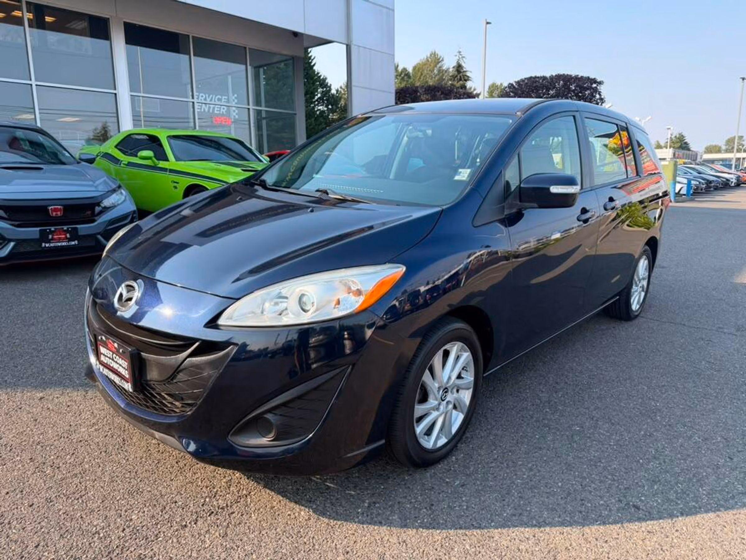 2014 Mazda 5 Sport Passenger Image 1