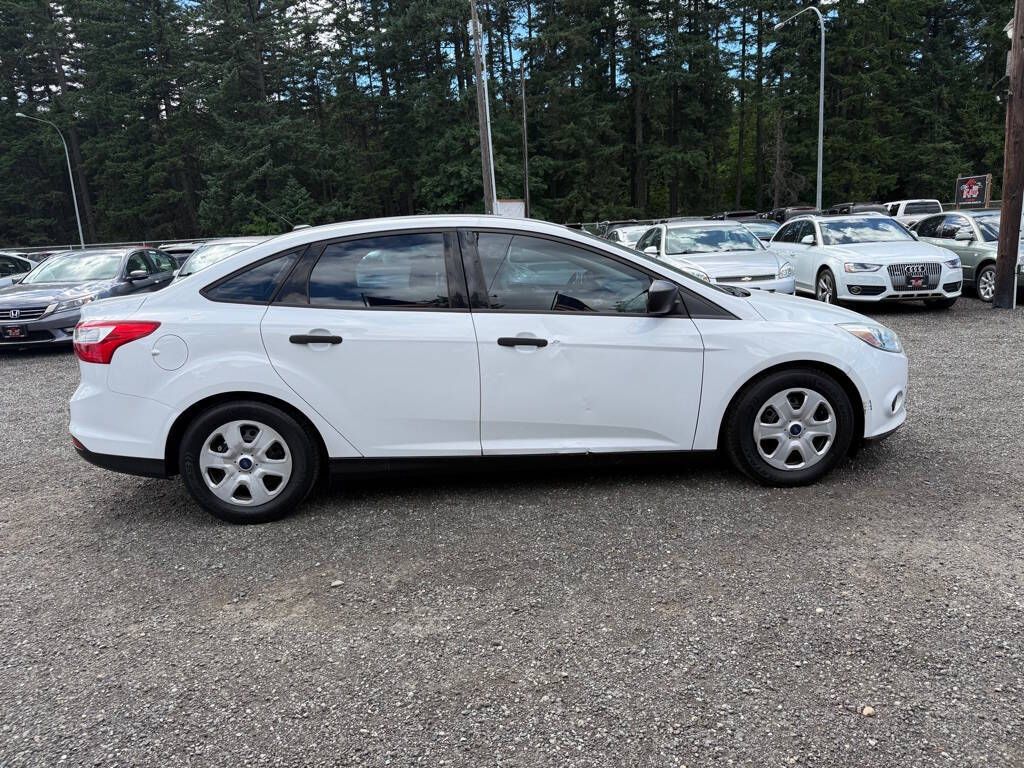 White 2014 Ford Focus Sedan Front-Wheel Drive 5-Speed Manual