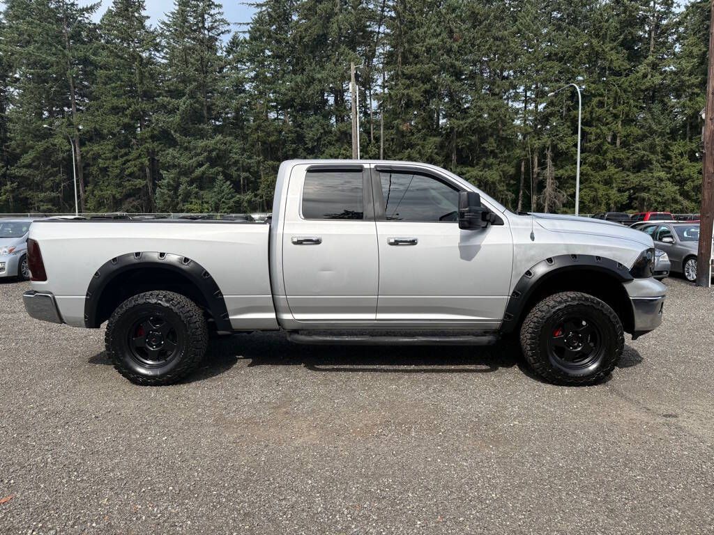 Silver 2010 Dodge RAM 1500 Pickup Truck Four-Wheel Drive Automatic