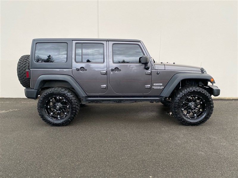 2014 Jeep Wrangler Unlimited Sport photo 2