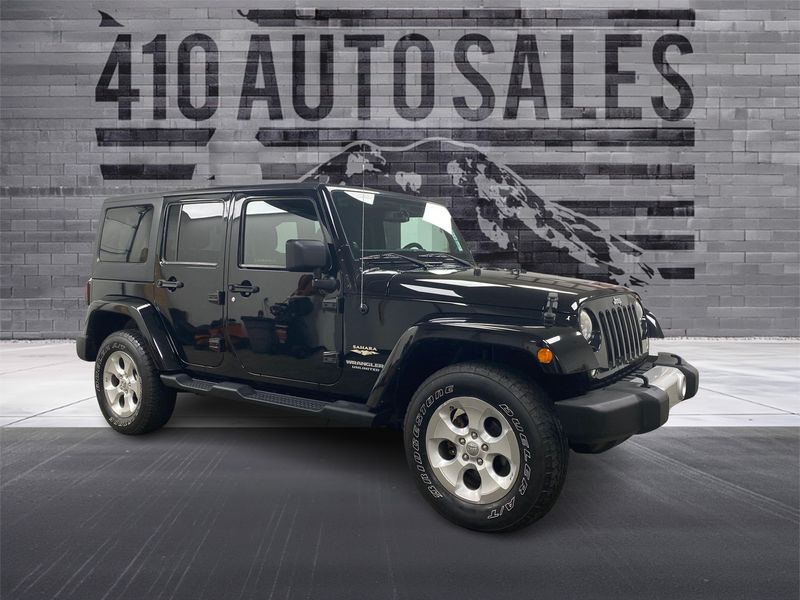 2014 Jeep Wrangler Unlimited Sahara 4X4 Upper Image 1