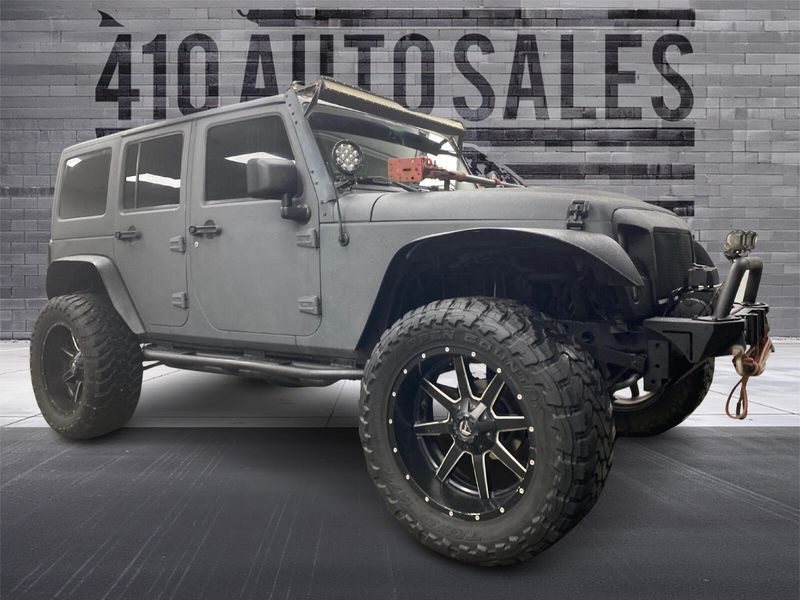 2014 Jeep Wrangler Unlimited 4x4 Freedom Edition *LIFTED* Upper Image 1